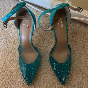 Mix No. 6 aqua blue heels with ankle strap and rhinestones.